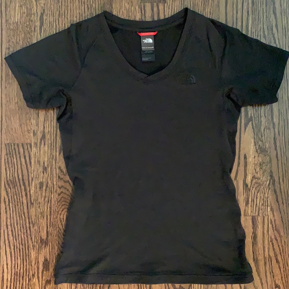 The North Face woman’s black short sleeve shirt in size small